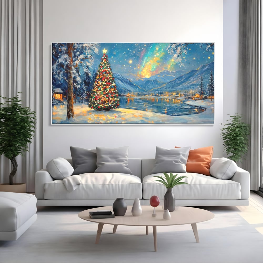 Tablou canvas cu pictura cu brad de craciun pe malul lacului, in rama de aluminiu argintiu, pe perete intr-un living